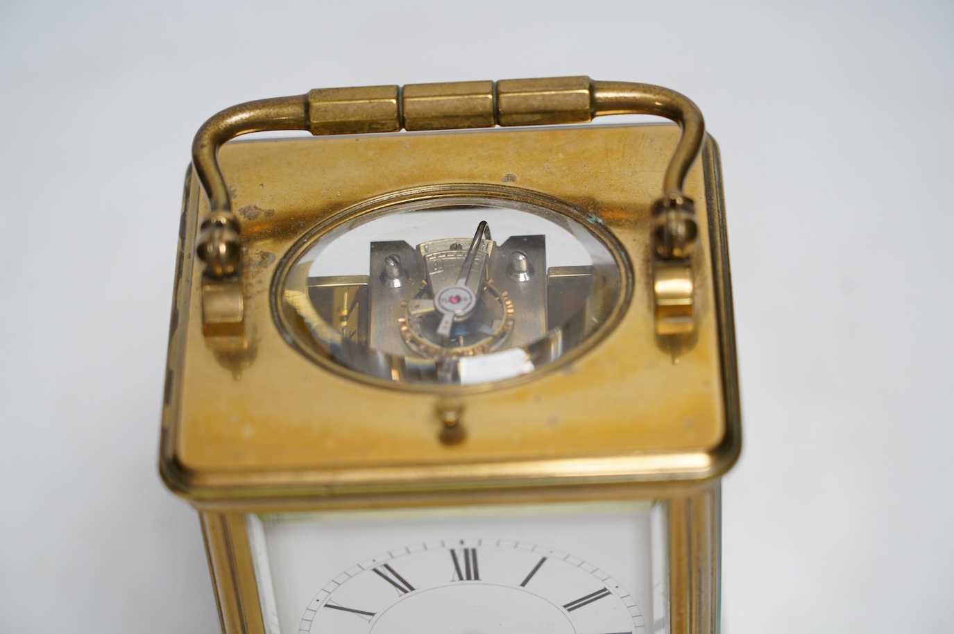 A late 19th century Henri Jacot brass cased eight day repeating carriage clock, 15cm. Condition - good, not tested as working